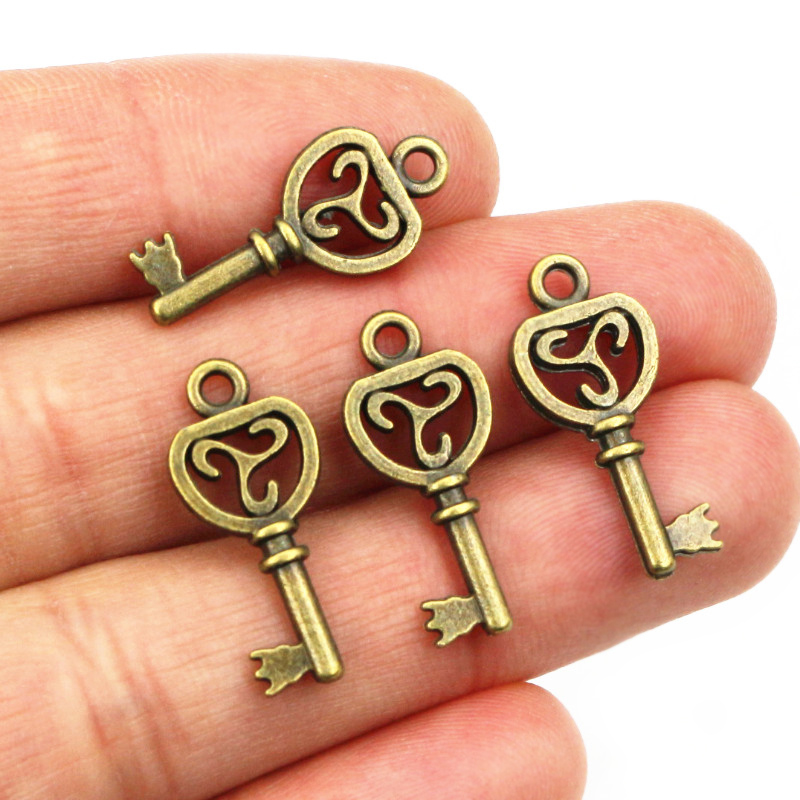 40ชิ้นเสน่ห์ที่สำคัญจี้สำริดโบ - Heart Locket Necklace Photo บทวิจารณ์และราคา